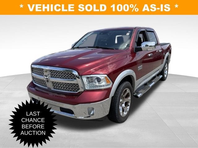 2014 RAM 1500 Laramie in Deep Cherry Red C — front three-quarter view