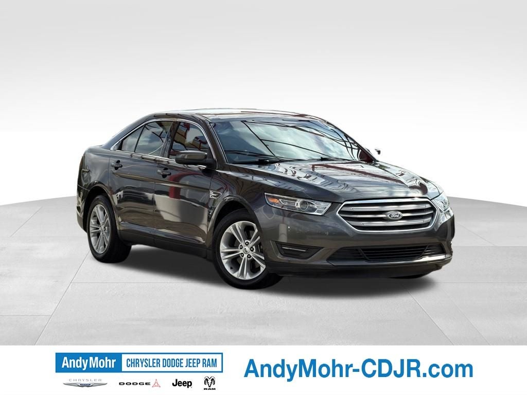 2017 Ford Taurus SEL in Magnetic — front three-quarter view