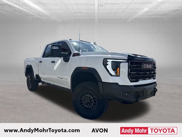 2025 GMC Sierra 2500HD AT4X AEV in Summit White — front three-quarter view