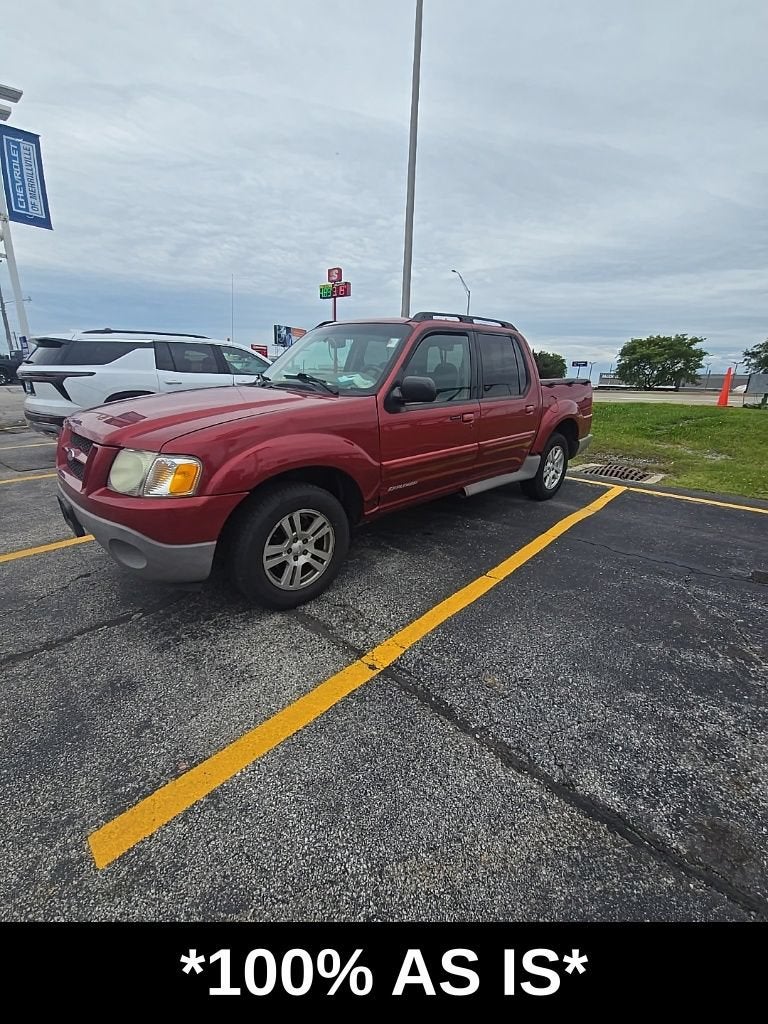 2002 Ford Explorer Sport Trac Value in Red — front three-quarter view