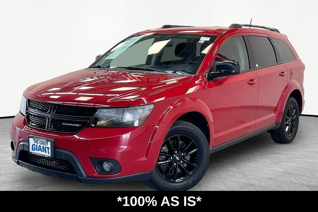 2019 Dodge Journey SE in Redline 2 Coat Pe — front three-quarter view