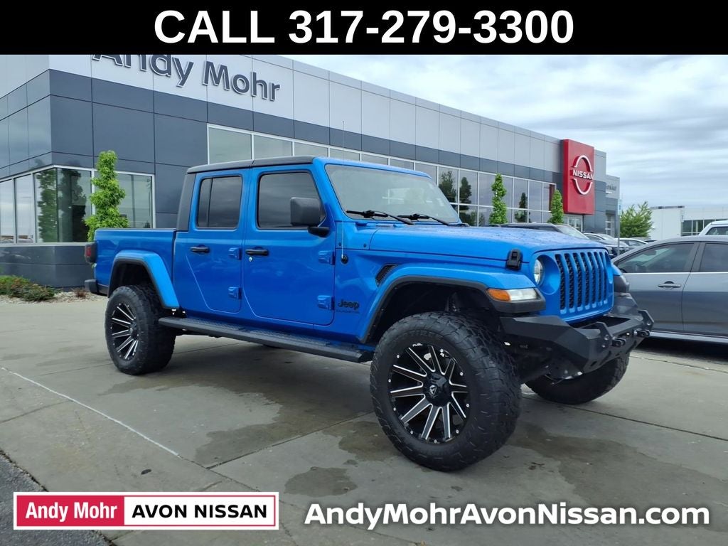 2021 Jeep Gladiator Sport in Blue Pearl — front three-quarter view