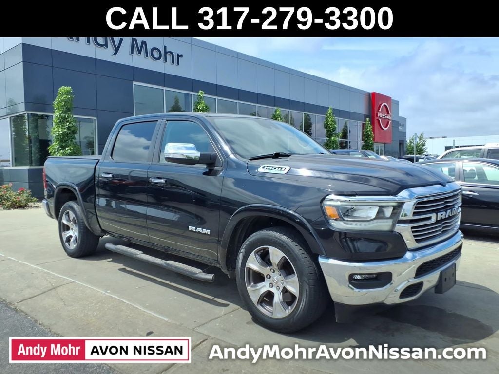 2022 RAM 1500 Laramie in Diamond Black — front three-quarter view