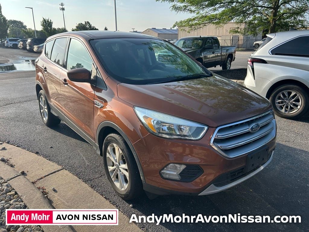 2017 Ford Escape SE in Canyon Ridge Metallic — front three-quarter view