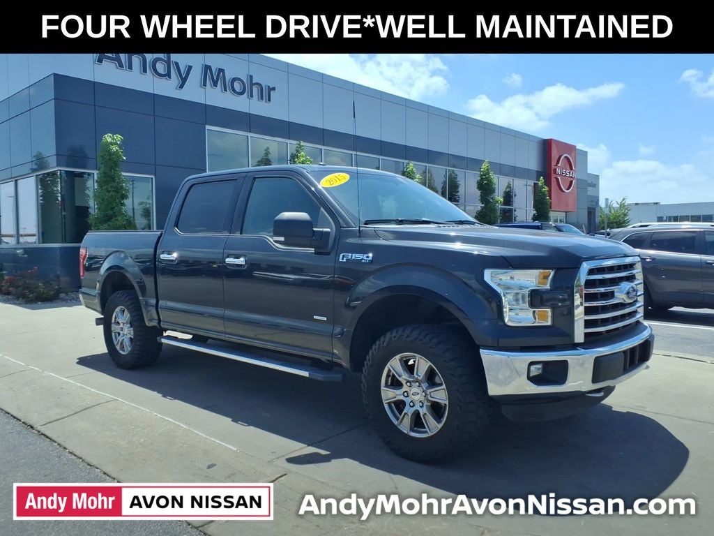 2015 Ford F-150 XLT in Tuxedo Black Metallic — front three-quarter view