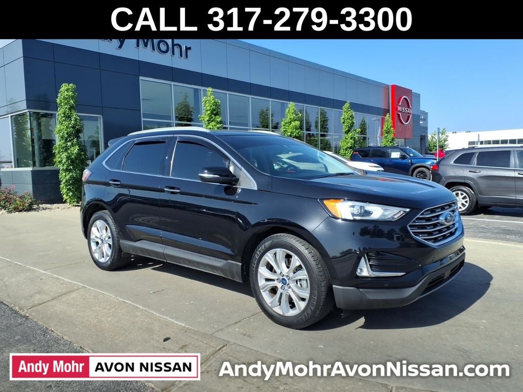 2020 Ford Edge Titanium in Agate Black — front three-quarter view