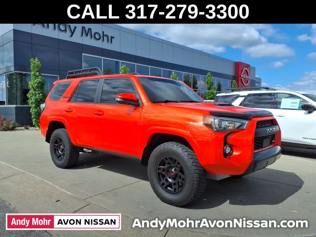 2023 Toyota 4Runner TRD Pro in Solar Octane — front three-quarter view