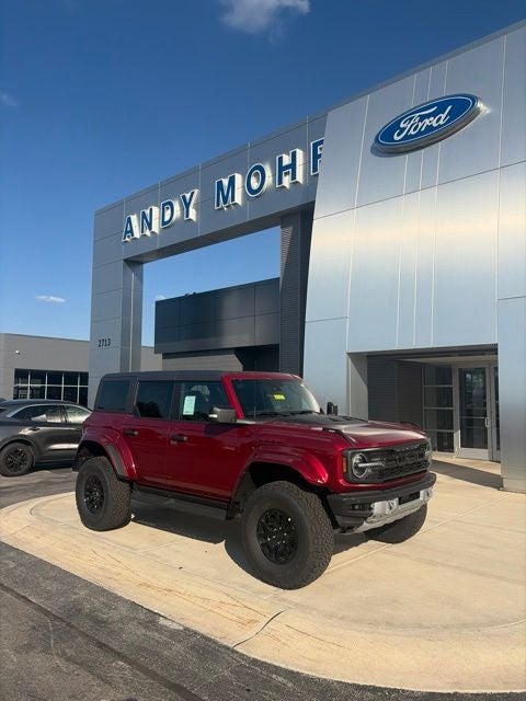 2026 Ford Bronco Raptor in Ruby Red Metallic — front three-quarter view