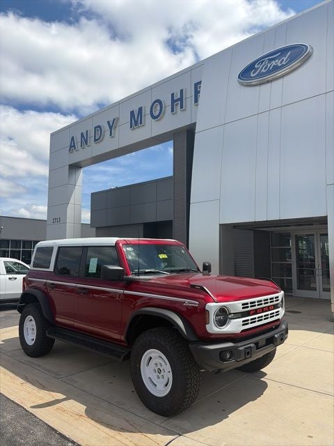2026 Ford Bronco Heritage Edition in Ruby Red Metallic — front three-quarter view