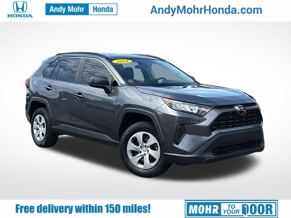 2021 Toyota RAV4 LE in Midnight Black Metallic — front three-quarter view
