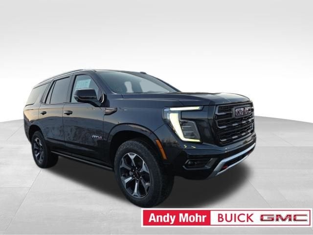 2026 GMC Yukon AT4 Ultimate in Titanium Rush Metallic — front three-quarter view
