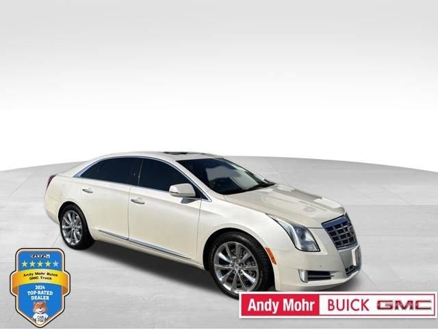 2013 Cadillac XTS Luxury in White Diamond Tricoat — front three-quarter view